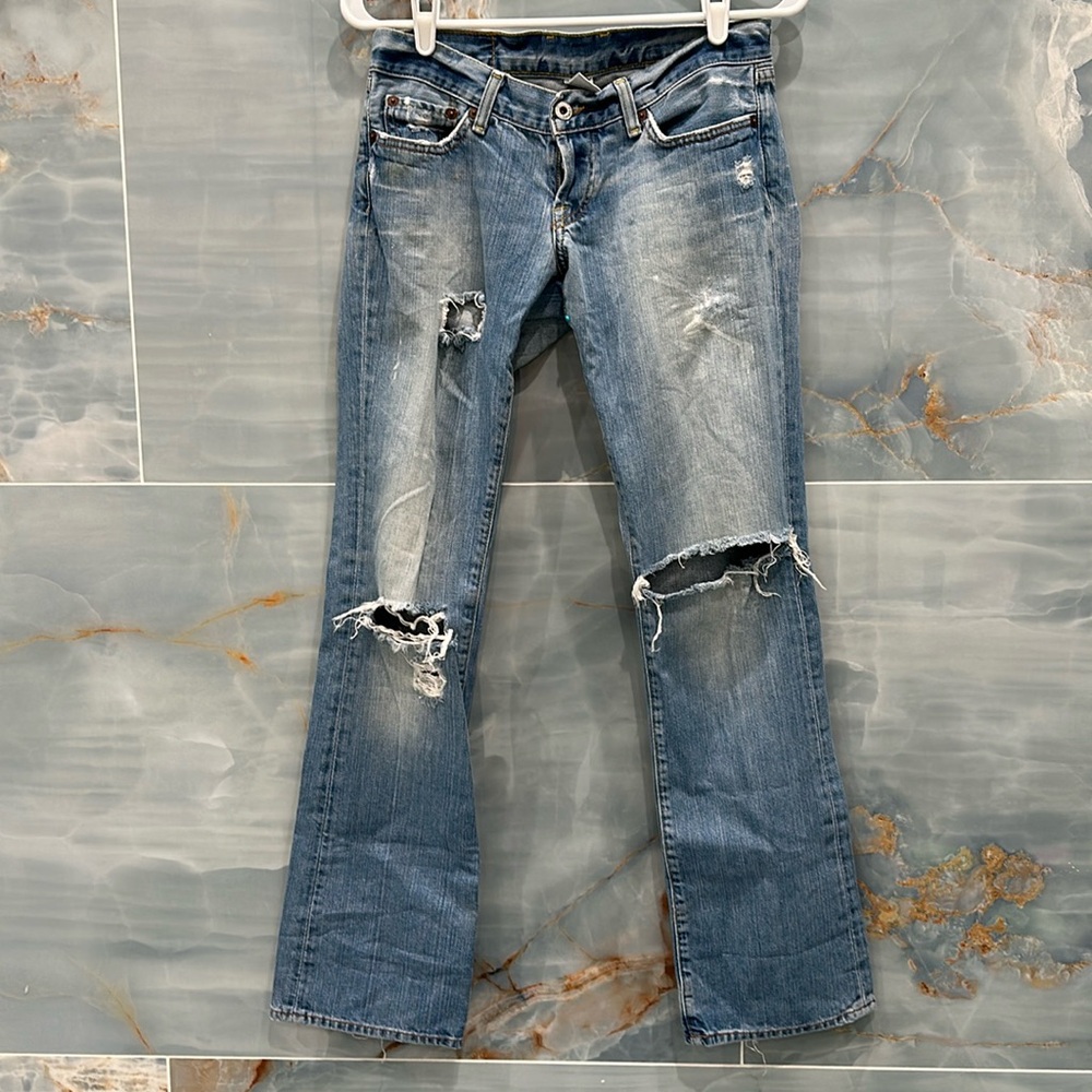 Lucky Brand low rise jeans very distessed